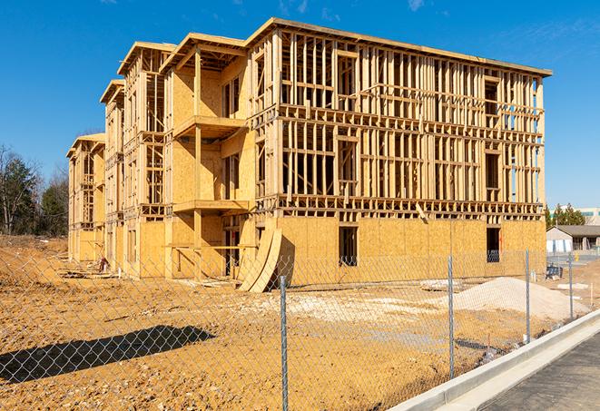 a snapshot of temporary chain link fences protecting a large construction project from unauthorized access in Southwest Ranches